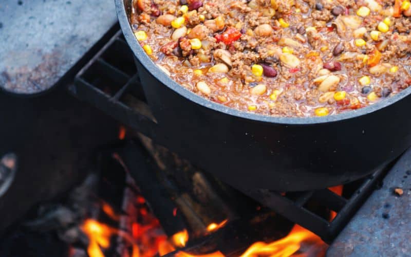 Pot of chili cooking over an open fire (SS)