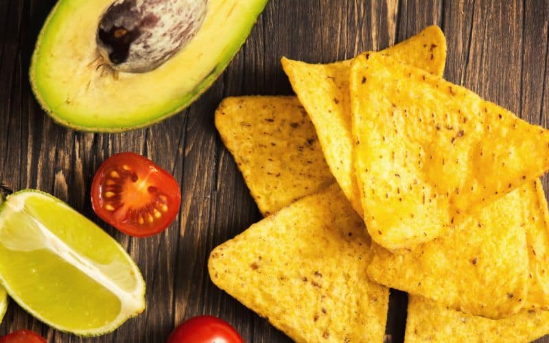 Tortilla chips, lime and avocado