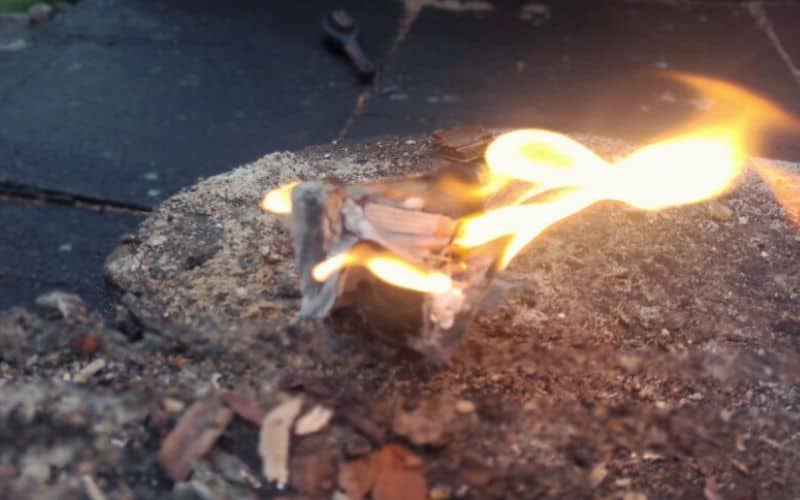 Egg carton fire starter on fire