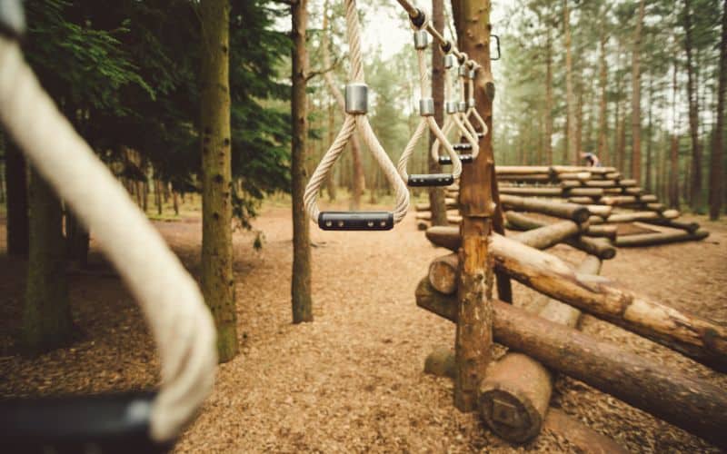 Wooden campground playground in the forest