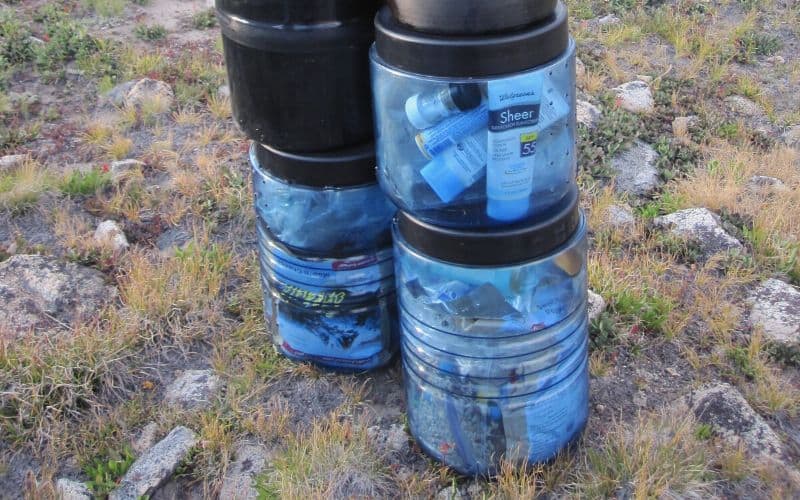 Bear canisters at campsite 