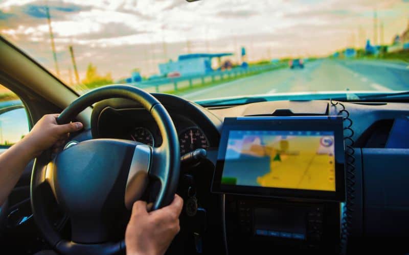 Map on tablet beside steering wheel