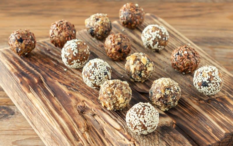 Protein balls on a wooden tray